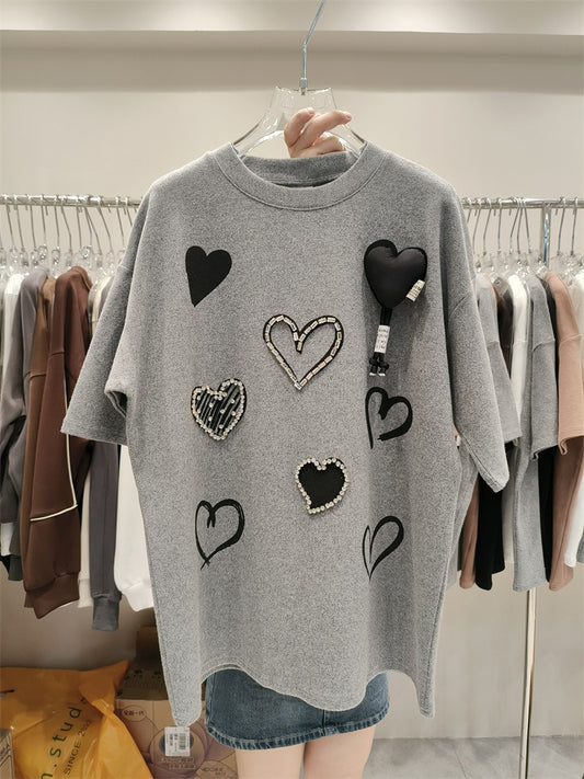 Design inspired round neck versatile mid length top